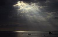 Light rays and boats near Kailua