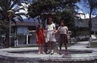 Valley of Longevity: little girls standing on edge of fountain