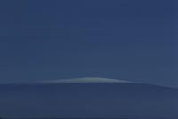 Faint light on distant peak, Mauna Loa