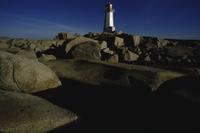 Lighthouse and rocks, morning light