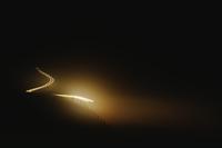 Car light in night fog