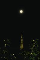 Pyramid" building and full moon 
