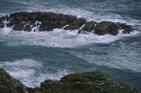 Rough sea against cliffs