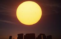 Stonehenge - setting sun with long lens 