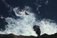 Waves crashing against cliff, Easter Island