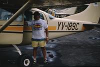 Guide/pilot and small plane near Angel Falls