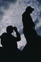 Silhouettes of photographers at Khutzeymateen Provincial Park