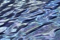 Satin bedspread - oil slick in harbour 