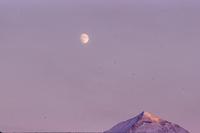 Moon and evening light on mountain