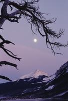 Moon and evening light on mountain
