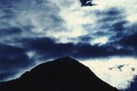 Silhouette of mountain and dramatic sky