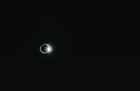 Sun flaring 'diamond ring' effect of sun reappearing (eclipse)