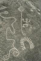 Petroglyphs on rock in museum 