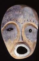 Inupiat whale bone mask carved by Edwiun J. Weyiouanna