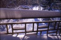 Reflecting pool - sequence of snow on upper patio fence patterns, looking down on pool