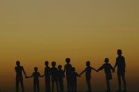 Sunset and silhouettes of children
