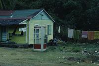 House, telephone booth, clothesline