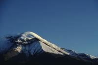 Peak of Mount Chimborazo in sunset light