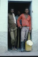 Men posing in a doorway