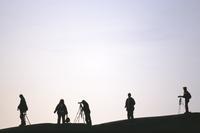 Photographers in silhouette
