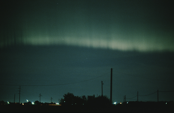 Northern lights above Saskatoon night sky.