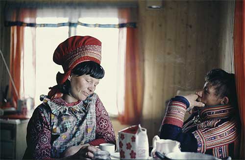 Sami woman and man in traditional dress