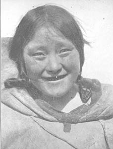 Smiling face of Inuit child.