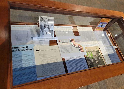 Display cabinet featuring materials relating to Doug Wilson.