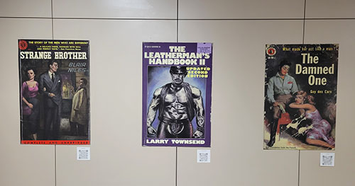 Three posters of pulp covers.